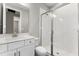 Modern bathroom with white vanity and glass shower at 2141 Divot Drive Dr, Daytona Beach, FL 32124