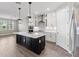 Spacious kitchen featuring a large island and modern cabinetry at 2141 Divot Drive Dr, Daytona Beach, FL 32124