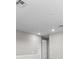Bright hallway with recessed lighting and neutral walls at 2153 Divot Dr, Daytona Beach, FL 32124