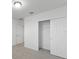 Bedroom with closet and grey carpet at 3182 Viceroy Ct, Poinciana, FL 34759