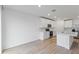 Modern kitchen with island and stainless steel appliances at 3182 Viceroy Ct, Poinciana, FL 34759