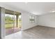 Bright dining area with sliding glass doors leading to a patio at 3174 Viceroy Ct, Poinciana, FL 34759