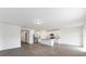Open concept kitchen with island and stainless steel appliances at 3174 Viceroy Ct, Poinciana, FL 34759