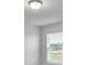 Bright bedroom with window blinds and neutral walls at 3793 Bluethread Way, Poinciana, FL 34759