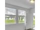 Bright bedroom with two windows and backyard view at 3793 Bluethread Way, Poinciana, FL 34759