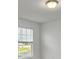 Bright bedroom with window blinds and neutral walls at 3793 Bluethread Way, Poinciana, FL 34759