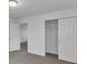 Bedroom with double door closet and view of bathroom at 3793 Bluethread Way, Poinciana, FL 34759