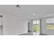 Bright living area with sliding doors to backyard at 3793 Bluethread Way, Poinciana, FL 34759