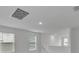 Upstairs hall with recessed lighting and windows with blinds at 3793 Bluethread Way, Poinciana, FL 34759