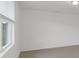 Bright bedroom with large window and tile flooring at 3166 Viceroy Ct, Poinciana, FL 34759