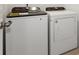 Laundry room with Whirlpool washer and dryer at 3166 Viceroy Ct, Poinciana, FL 34759