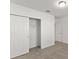 Bedroom with walk-in closet and neutral color scheme at 3166 Viceroy Ct, Poinciana, FL 34759