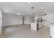 Modern kitchen with island and stainless steel appliances at 3166 Viceroy Ct, Poinciana, FL 34759