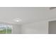 Spacious bedroom with window and neutral walls at 3166 Viceroy Ct, Poinciana, FL 34759