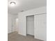 Bright bedroom featuring a double door closet at 3166 Viceroy Ct, Poinciana, FL 34759
