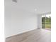 Living room with sliding glass doors and view of backyard at 3170 Viceroy Ct, Poinciana, FL 34759