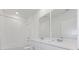 Modern bathroom with double vanity, bathtub and shower at 3170 Viceroy Ct, Poinciana, FL 34759