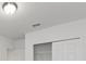Spacious bedroom closet with sliding doors and shelving at 3170 Viceroy Ct, Poinciana, FL 34759