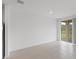 Living room with sliding doors and view of backyard at 3150 Viceroy Ct, Poinciana, FL 34759