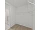 Spacious walk-in closet with wire shelving at 3150 Viceroy Ct, Poinciana, FL 34759