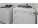 Bright laundry room with a washer and dryer at 3150 Viceroy Ct, Poinciana, FL 34759