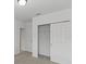 Bright bedroom with double doors leading to a spacious closet at 3150 Viceroy Ct, Poinciana, FL 34759
