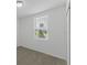 Simple bedroom with window and neutral walls at 3150 Viceroy Ct, Poinciana, FL 34759