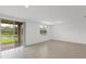 Bright living room with sliding glass doors leading to a patio at 3150 Viceroy Ct, Poinciana, FL 34759