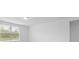 Bright bedroom with window and neutral wall colors at 3150 Viceroy Ct, Poinciana, FL 34759