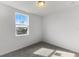 Bedroom with window and carpeted floor at 3206 Viceroy Ct, Poinciana, FL 34759