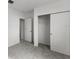 Bedroom with closet and carpeted floor at 3206 Viceroy Ct, Poinciana, FL 34759