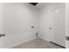 Laundry room with tile floor and door to exterior at 3206 Viceroy Ct, Poinciana, FL 34759