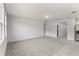 Bright and airy living room with neutral carpeting at 3206 Viceroy Ct, Poinciana, FL 34759