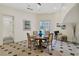 Charming breakfast nook with a round table and chairs, adjacent to the kitchen at 2417 Alaqua Dr, Longwood, FL 32779