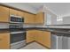 Modern kitchen with stainless steel appliances and ample counter space at 737 Siena Palm Dr # 737, Celebration, FL 34747