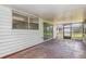 Screened porch with sliding glass doors and backyard access at 1916 Colton Dr, Orlando, FL 32822