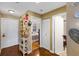 Bright condo entryway with wood floors, storage, and view into bedroom at 4113 Fairview Vista Pt # 308, Orlando, FL 32804