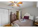 Comfortable bedroom with ceiling fan and built-in closet at 4113 Fairview Vista Pt # 308, Orlando, FL 32804