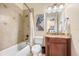 Bathroom with shower/tub combo, toilet and vanity at 213 Arezzo Ct, Sanford, FL 32771