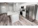 Modern kitchen with stainless steel appliances and granite countertops at 4455 Se 24Th St, Ocala, FL 34471