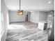 Open living area with wood-look floors at 4455 Se 24Th St, Ocala, FL 34471