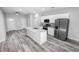 Modern kitchen with stainless steel appliances and granite countertops at 4455 Se 24Th St, Ocala, FL 34471