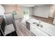 Kitchen features stainless steel appliances, granite countertops, and an island at 4455 Se 24Th St, Ocala, FL 34471