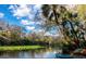 Kayaks on the riverbank of a calm waterway at 1694 Pinecliff Dr, Apopka, FL 32703