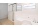 Clean bathroom with shower and bathtub at 15639 Greater Groves Blvd, Clermont, FL 34714