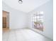 Bright dining room with large window and tile floors at 15639 Greater Groves Blvd, Clermont, FL 34714