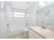 Simple bathroom with bathtub and single sink vanity at 15639 Greater Groves Blvd, Clermont, FL 34714