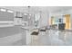 Modern kitchen with gray cabinets, marble countertops, and island at 100 S Eola Dr # 1112, Orlando, FL 32801