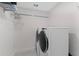 Well-lit laundry room with washer and dryer at 100 S Eola Dr # 1112, Orlando, FL 32801