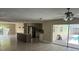 Open kitchen with stainless steel appliances and view of backyard pool at 2406 W Orange Blvd, Kissimmee, FL 34741